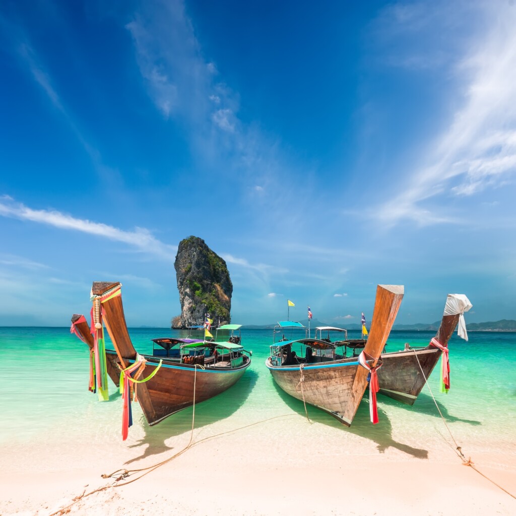 Amazing tropical landscape with Thai traditional boat. Thailand